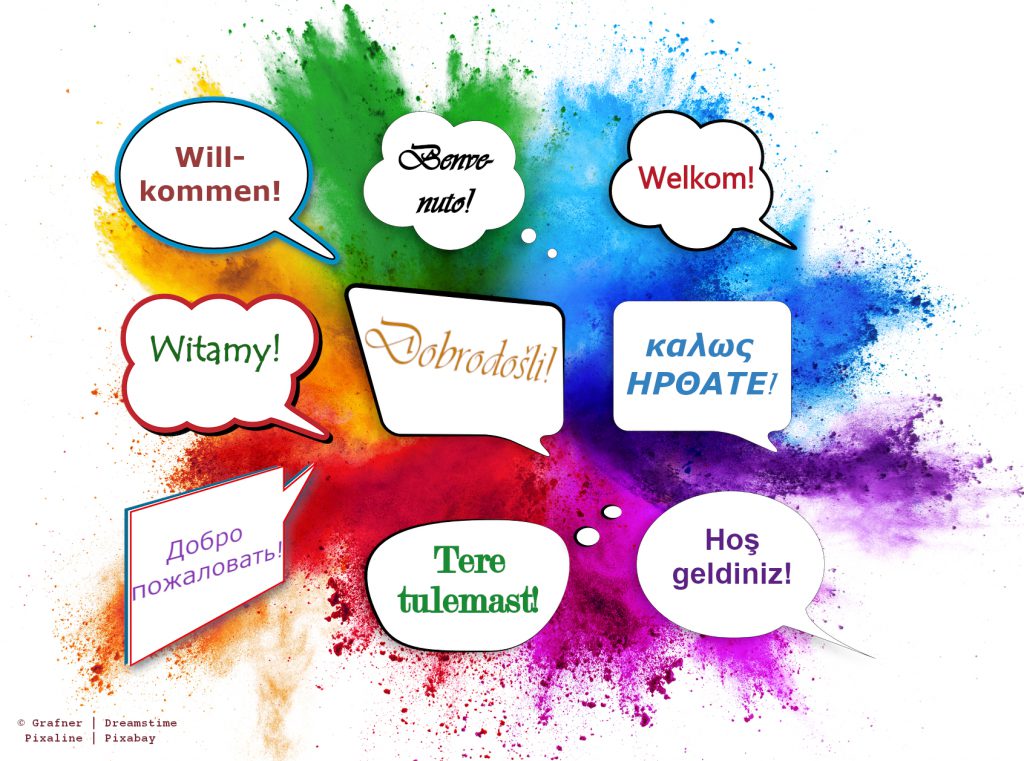 Welcome - Multilingual Speech Bubbles on colourful Background